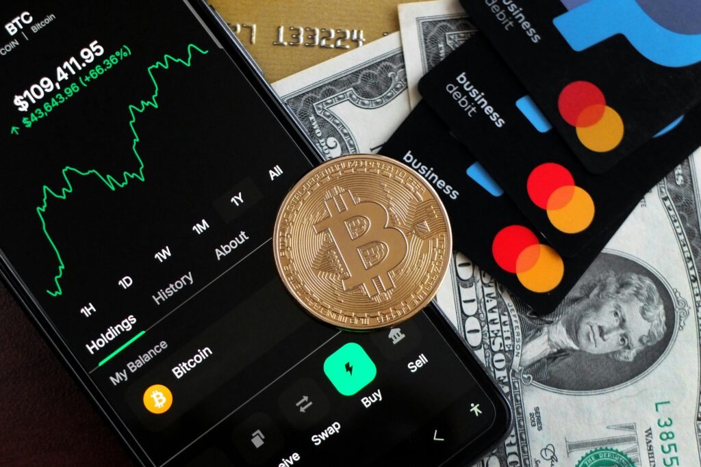How to Withdraw Crypto From an Exchange to a Wallet A visual representation of Bitcoin trading and financial transactions with credit cards and cash.
