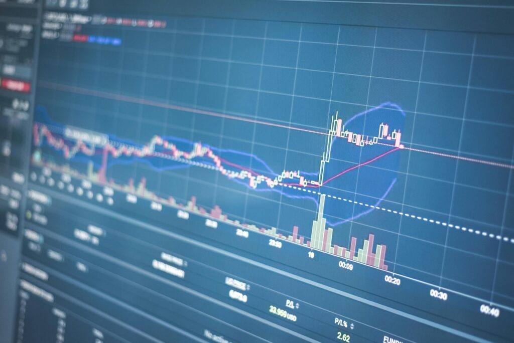 How to Read a Crypto Price Chart for Beginners Close-up of a financial graph on a screen showing stock market trading data and trends.