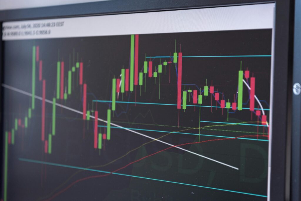 How to Build a Crypto Portfolio From Scratch in 2026 A close-up view of a cryptocurrency trading chart displayed on a monitor, showcasing market trends.