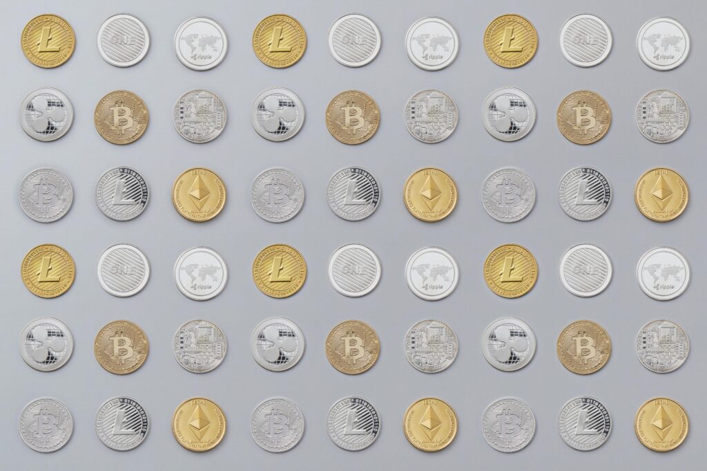 Types of Crypto Coins Explained for Beginners A seamless pattern of various cryptocurrency coins in gold and silver tones.