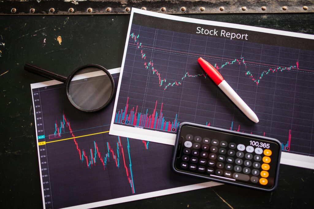 What Is Market Cap and Why It Matters in Crypto Stock report with charts, calculator, and magnifying glass for financial analysis.